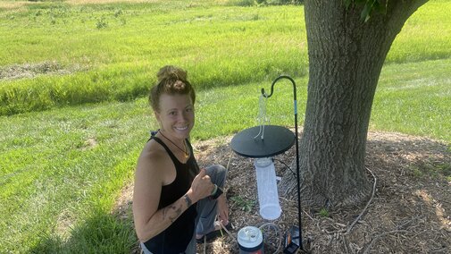 One Health Project Coordinator Courtney Brummel setting up mosquito traps at study sites near AltEn.